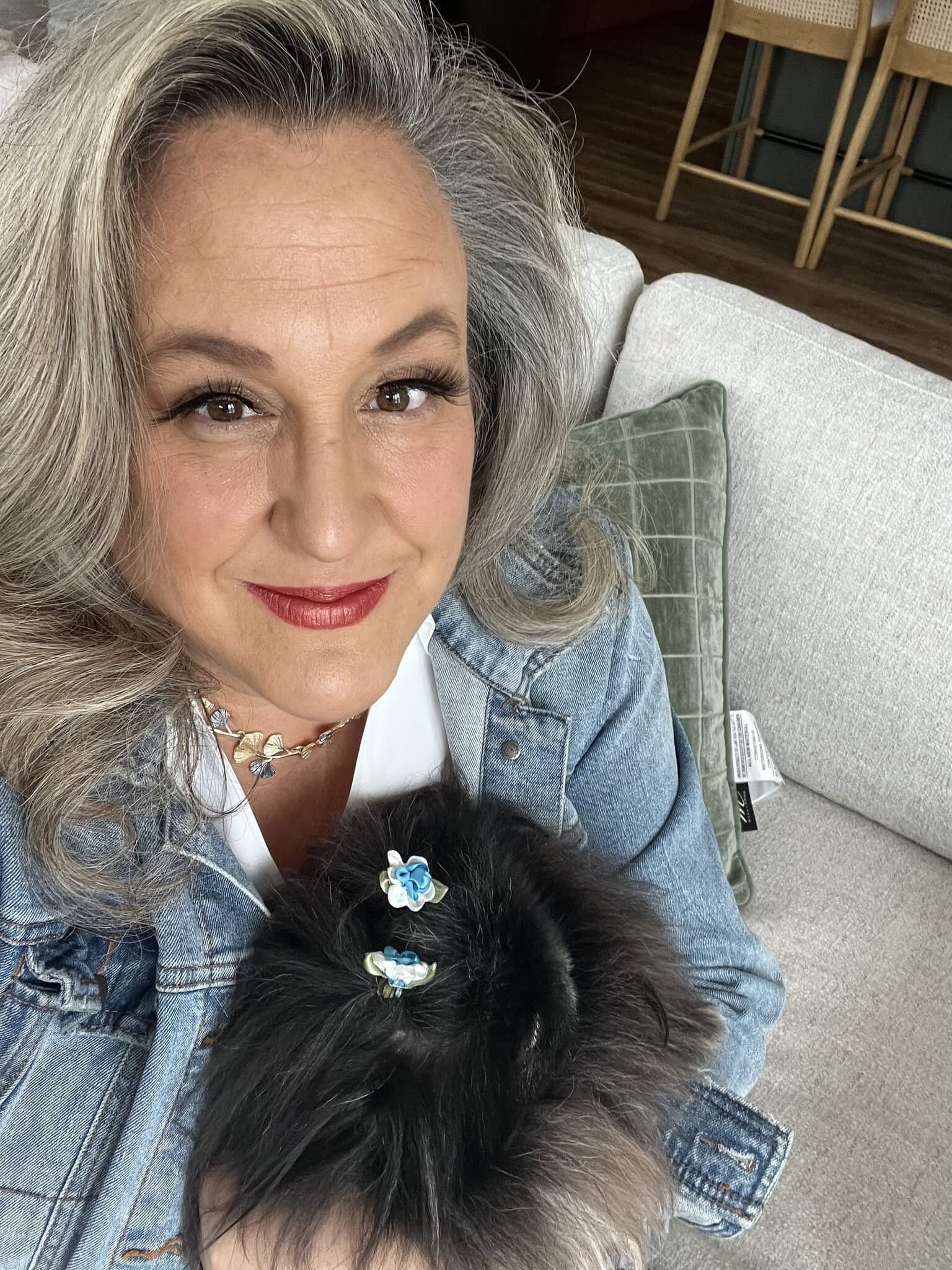 Top 5% Wisconsin realtor Anne Baranski holding her dog